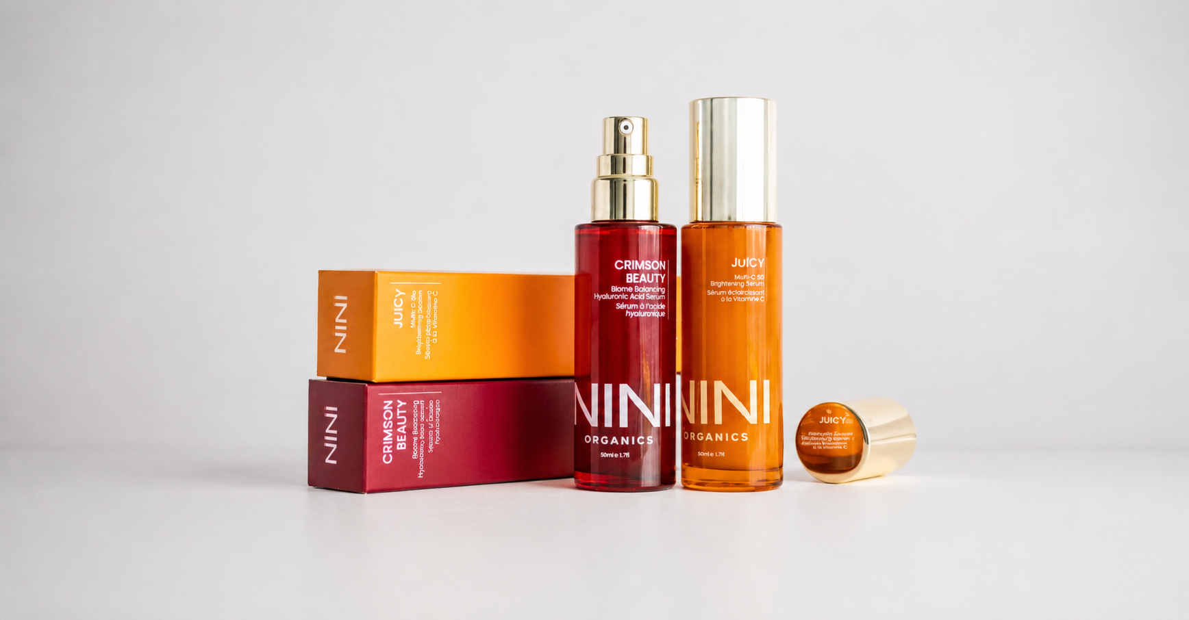 NINI Organics skincare Crimson Beauty and JuiCY products on a white background